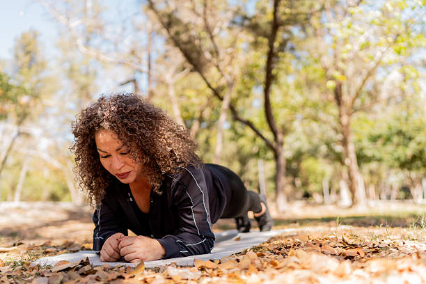 Person performing a gentle mobility stretch outdoors